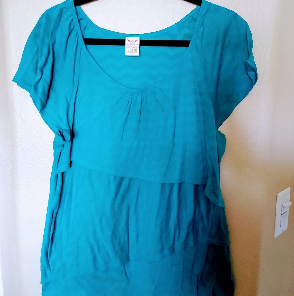 Teal ruffled chevron style top